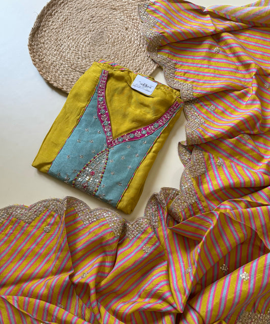 Yellow unstitched silk suit with scalloped dupatta