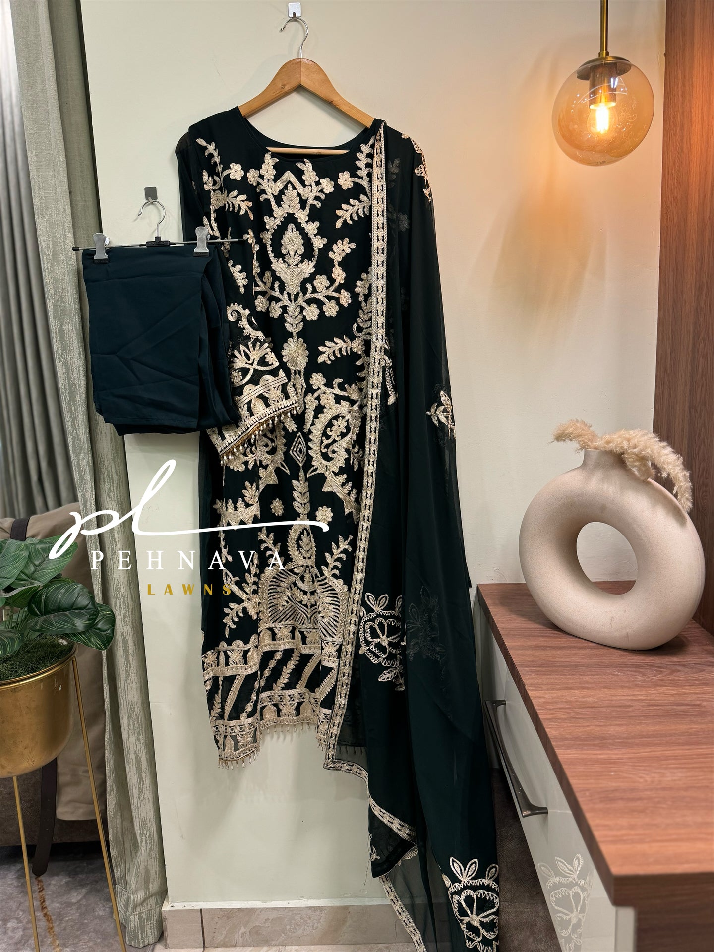 Embroidered georgette suit with moti latkan