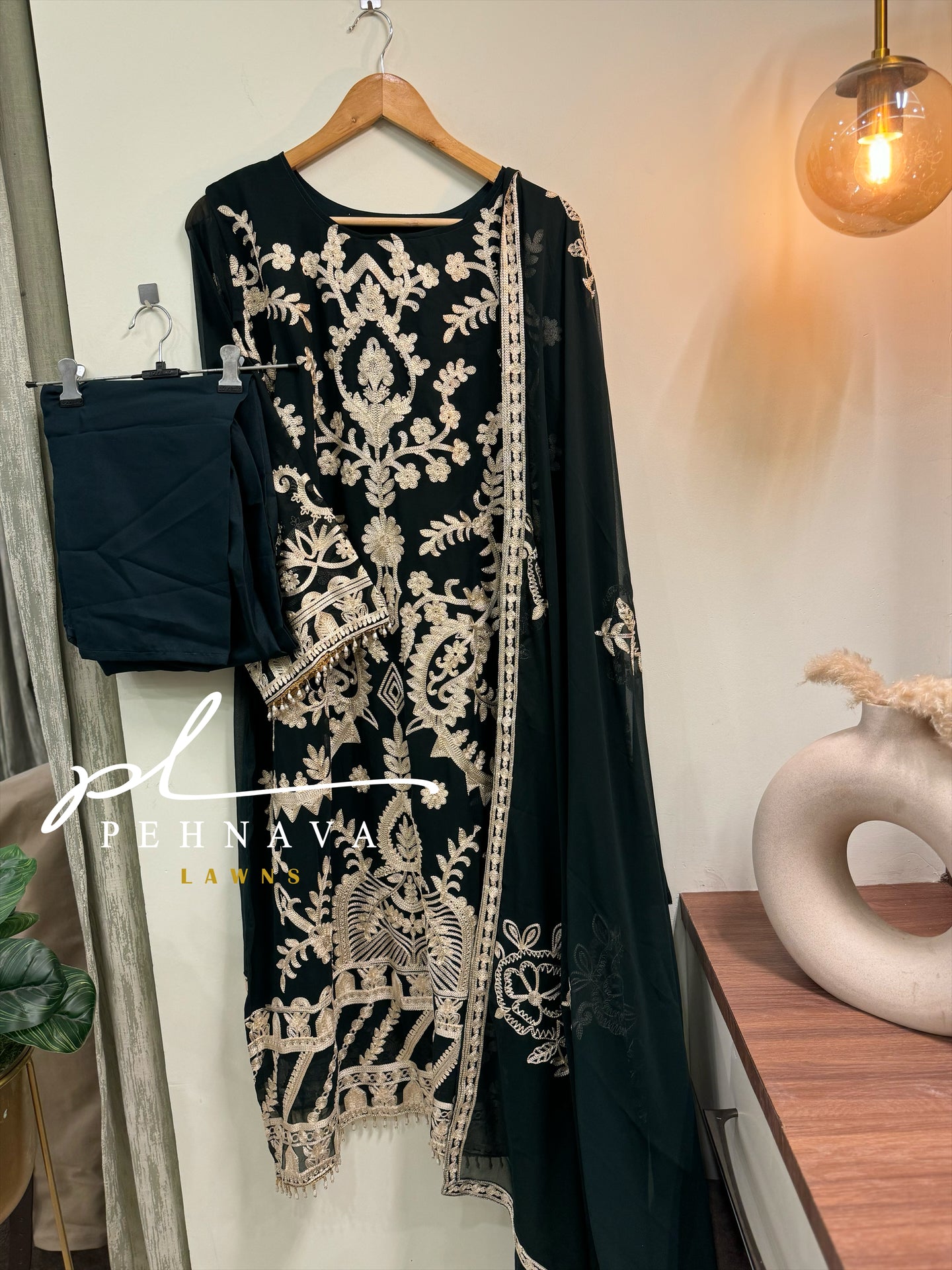 Embroidered georgette suit with moti latkan