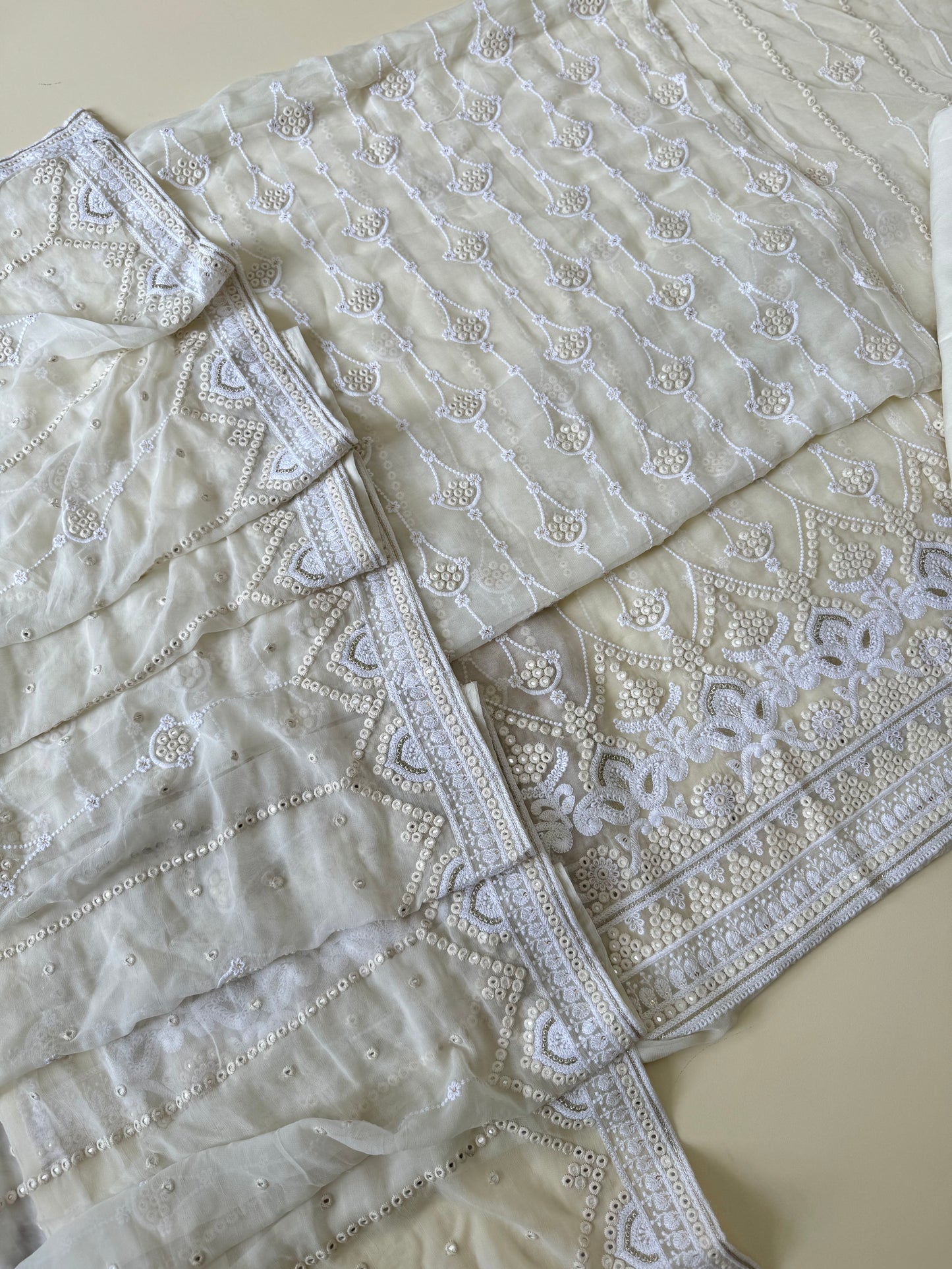 Pure georgette embroidered with mirror detailings