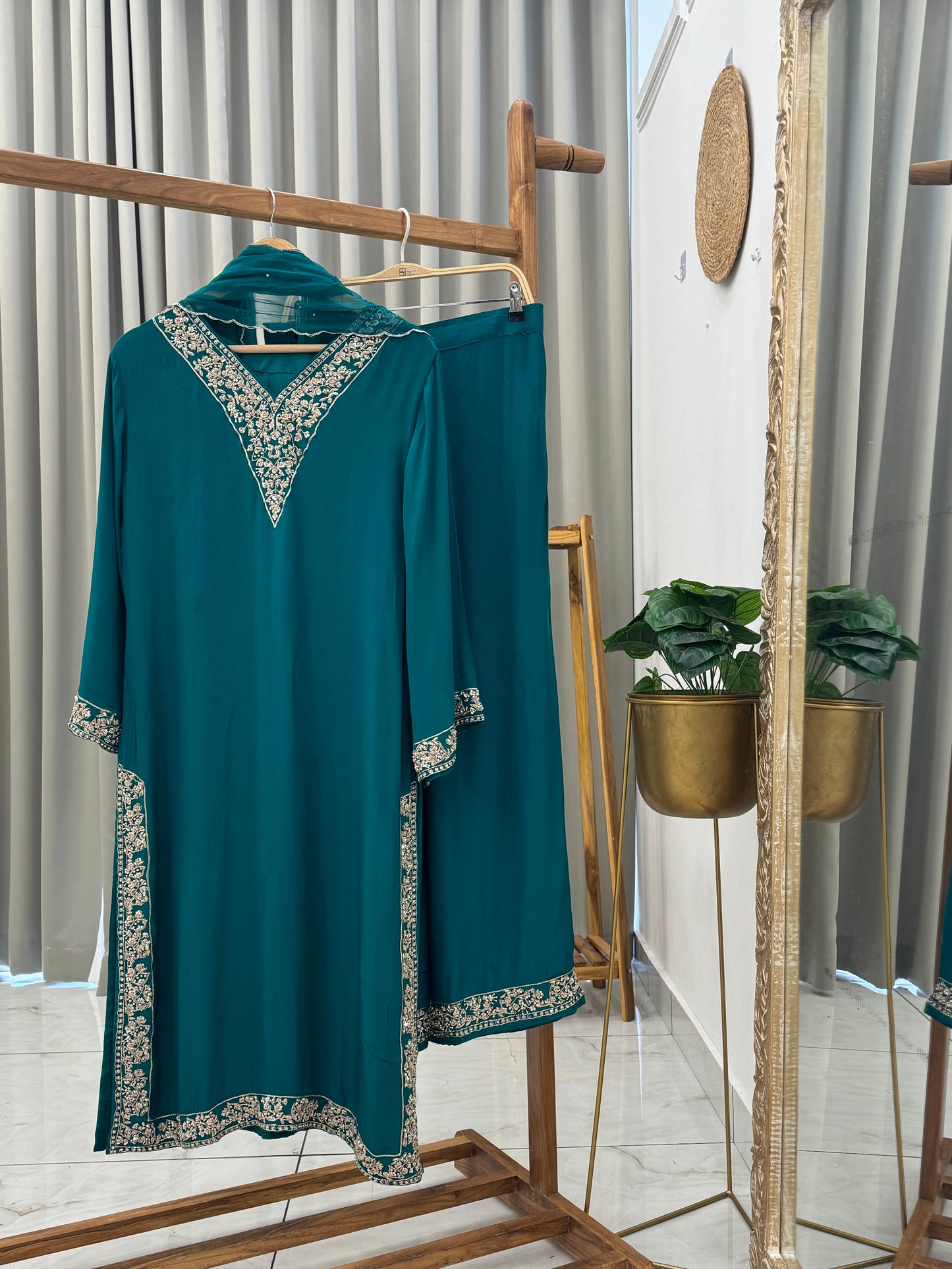 Pure crepe hand embroidered suit with scalloped Dupatta