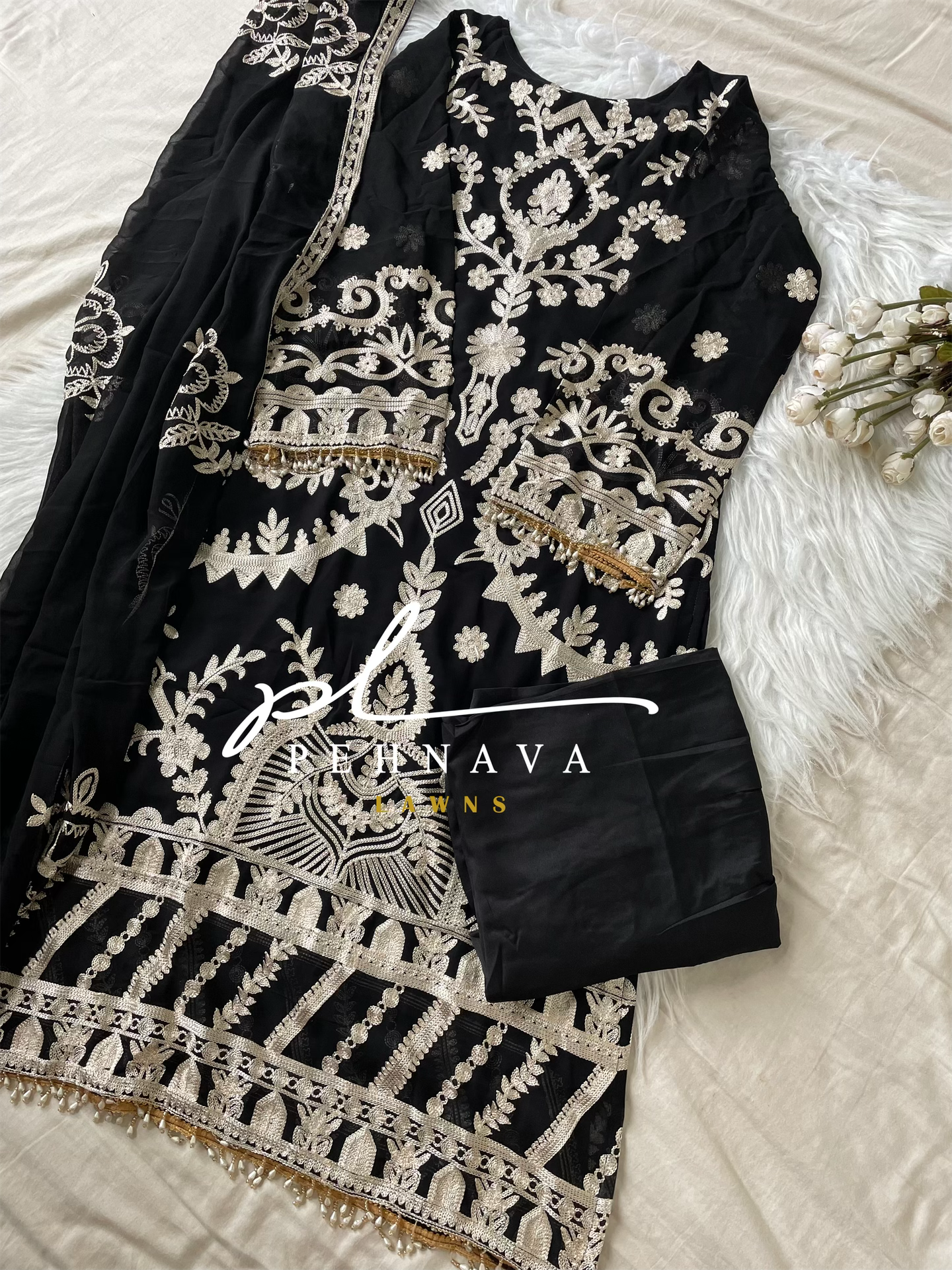 Embroidered georgette suit with moti latkan