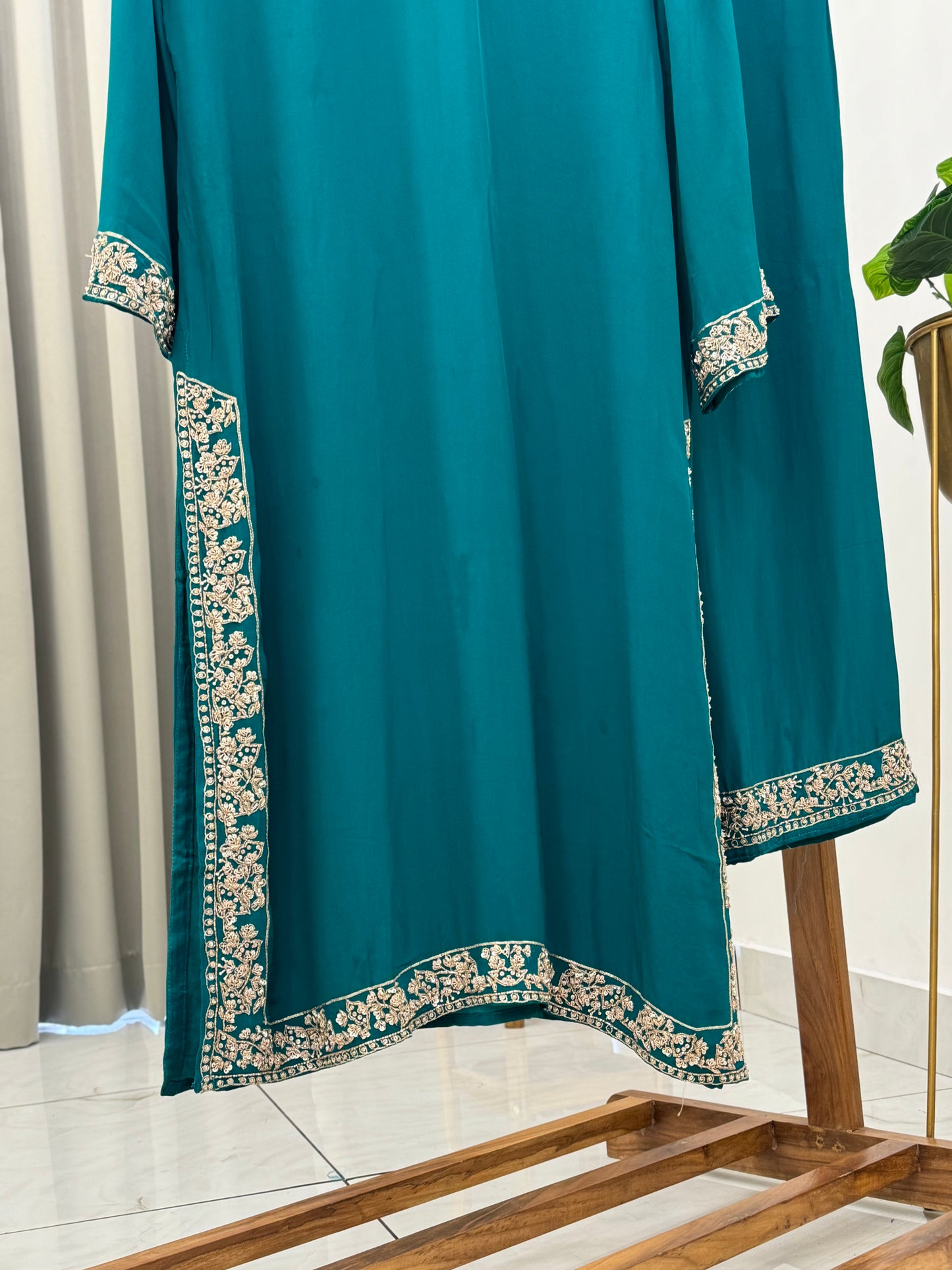 Pure crepe hand embroidered suit with scalloped Dupatta