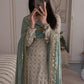 Embroidered georgette suit with mirror embroidered dupatta and moti latkan